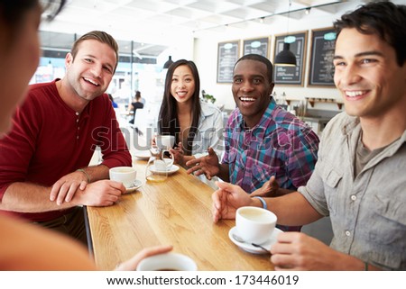 Group Of Friends Meeting In Coffee Shop Group Of Friends Meeting In Coffee Shop