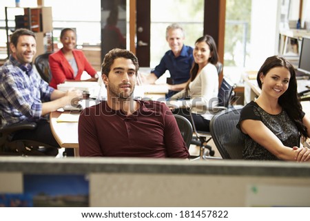 Portrait Of Office Staff At Table In Architect\'s Office