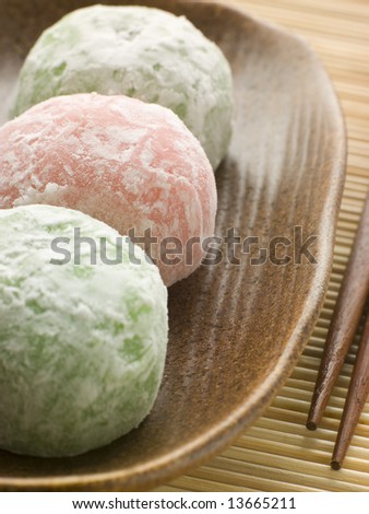 Plate of Assorted Rice cakes with chopsticks