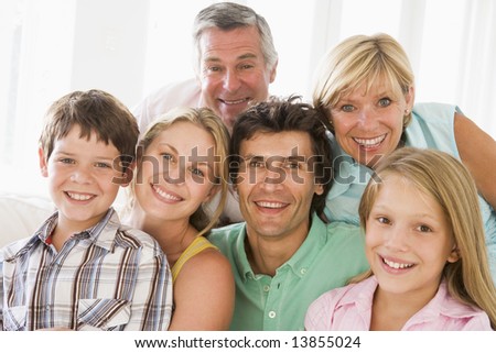 Family indoors together smiling
