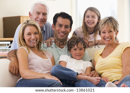 Extended family in living room smiling