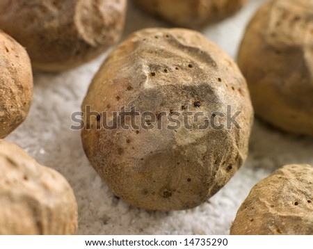 Jacket Potatoes baked on a tray of Sea Salt