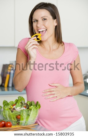 pregnant woman eating. stock photo : Pregnant woman