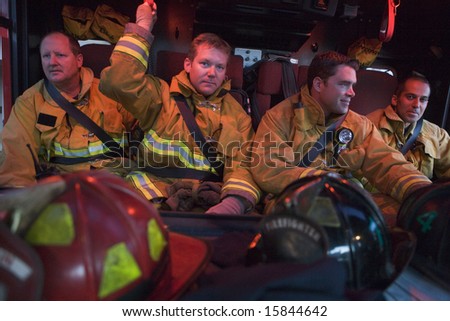 Firefighters travelling to an emergency