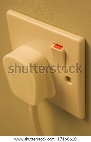 Electric Plug Connected To Outlet