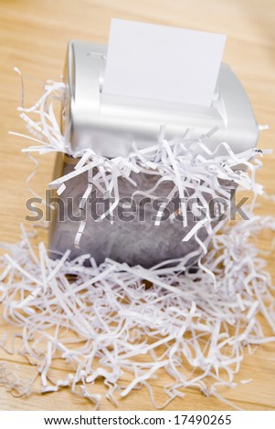 An Overflowing Paper Shredder