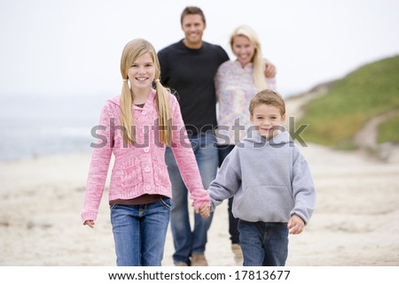 people walking on beach. people walking on each