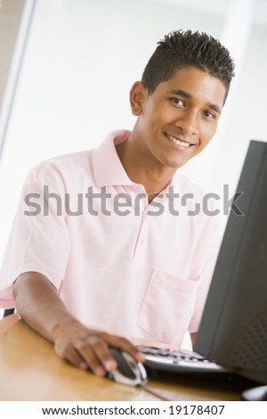 Teenage Boy Using A Computer