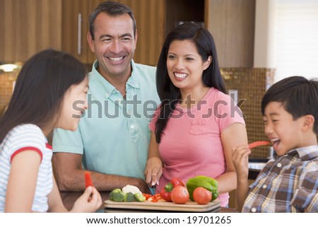 Family Preparing meal,mealtime Together