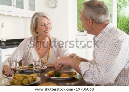 Elderly Couple Enjoying meal,mealtime Together