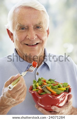 Senior Man Eating Salad