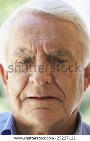 Portrait Of Senior Man Looking Anxious