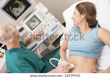Doctor Giving Patient An Ultra Sound