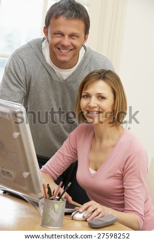 Couple Using Computer