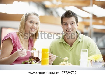 Couple Having Lunch At The Mall
