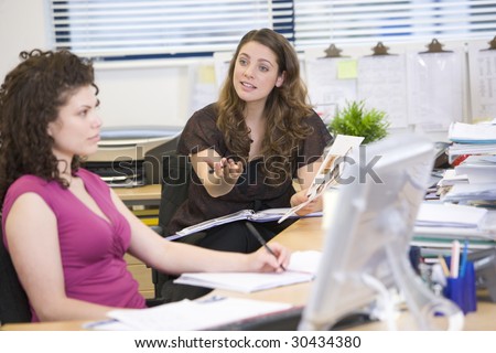 Women having an argument at work