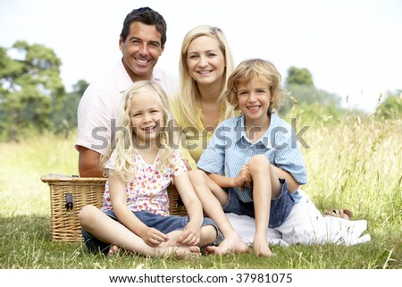 Family having picnic in countryside