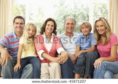 Extended Family Relaxing At Home Together