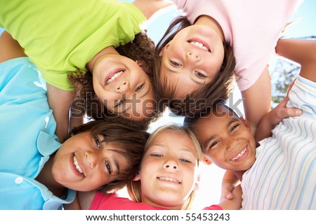 Group Of Children Looking Down Into Camera