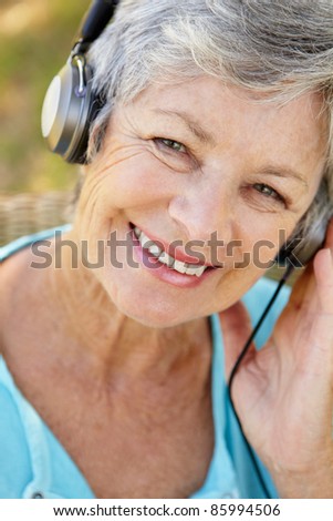 Senior woman with headphone