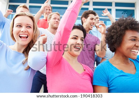 Audience Dancing At Outdoor Concert Performance
