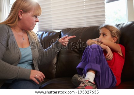 Mother Telling Off Daughter At Home