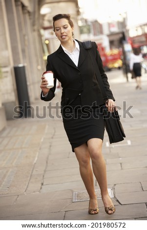 Businesswoman hurrying to work