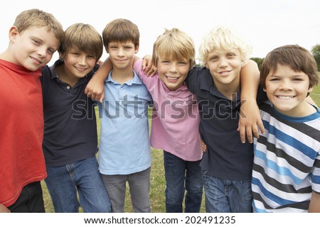 Portrait group of boys in park