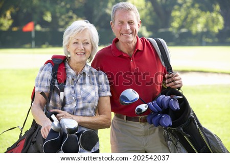 Senior couple on golf course