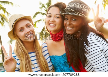 Group Of Female Friends Having Fun In Park Together