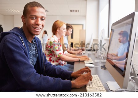 College Students Using Computers On Media Studies Course