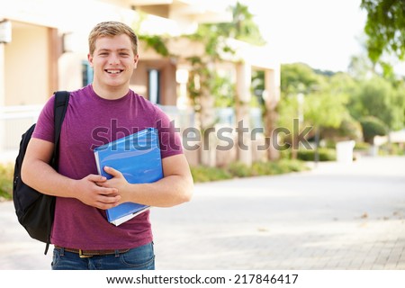 Portrait Of Male University Student Outdoors On Campus