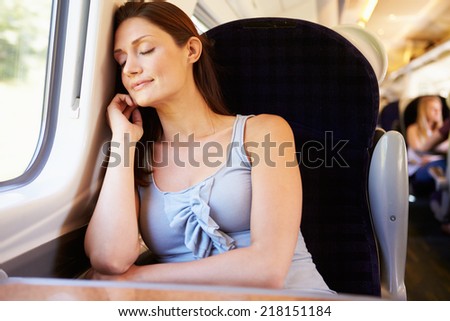 Woman Resting On Train Journey