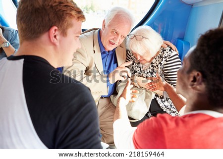 Senior Couple Being Harassed On Bus Journey
