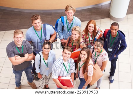 Overhead Portrait Of College Students Standing In Hallway