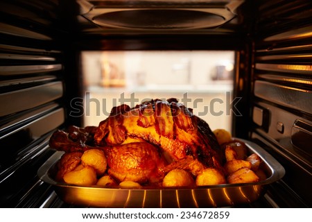 Thanksgiving Turkey Roasting Inside Oven Thanksgiving Turkey Roasting Inside Oven