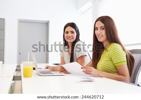 Portrait Of Two Women Working Together In Design Studio
