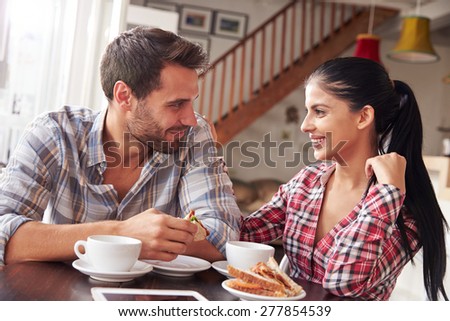 Couple meeting in a cafe