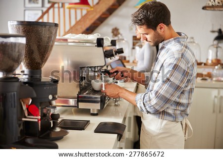 Barista at work in a cafe