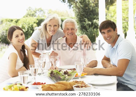 Parents and Adult Children enjoying Al Fresco Meal