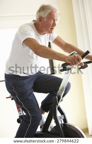 Senior Man On Exercise Bike