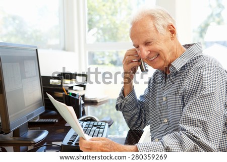 Senior man working at home