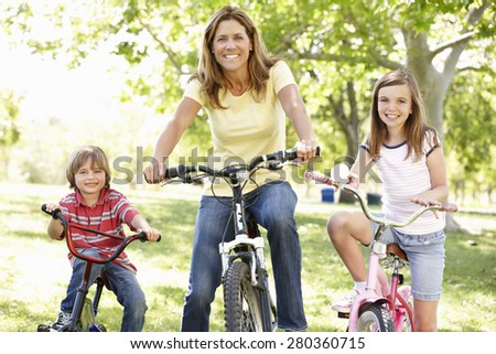 Mother and children on bikes