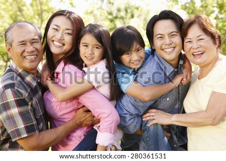 Portrait multi-generation Asian family in park