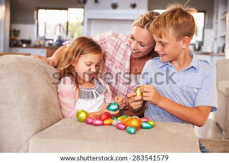 Mother celebrating Easter at home with kids