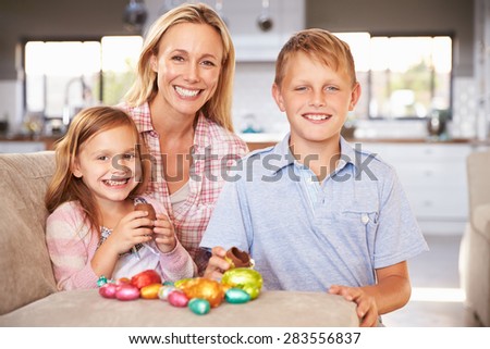 Mother celebrating Easter at home with kids