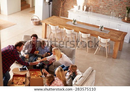 Two families spending time together at home