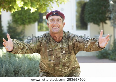 Soldier Returning Home Extending Arms In Greeting