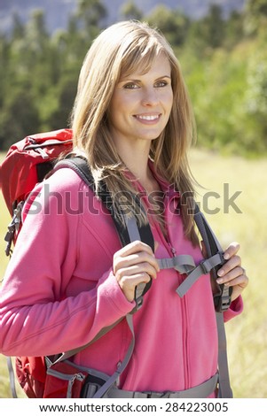 Woman On Hike In Beautiful Countryside
