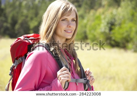 Woman On Hike In Beautiful Countryside